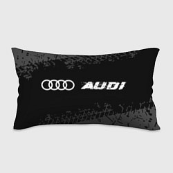 Подушка-антистресс Audi speed на темном фоне со следами шин по-горизо