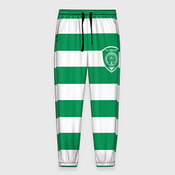 Мужские брюки ФК Ахмат на фоне бело зеленой формы
